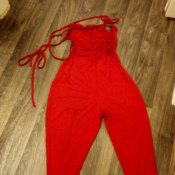 Nice onesie with side strings and back out. Sexy night out or club scene. - Picture 2 of 2